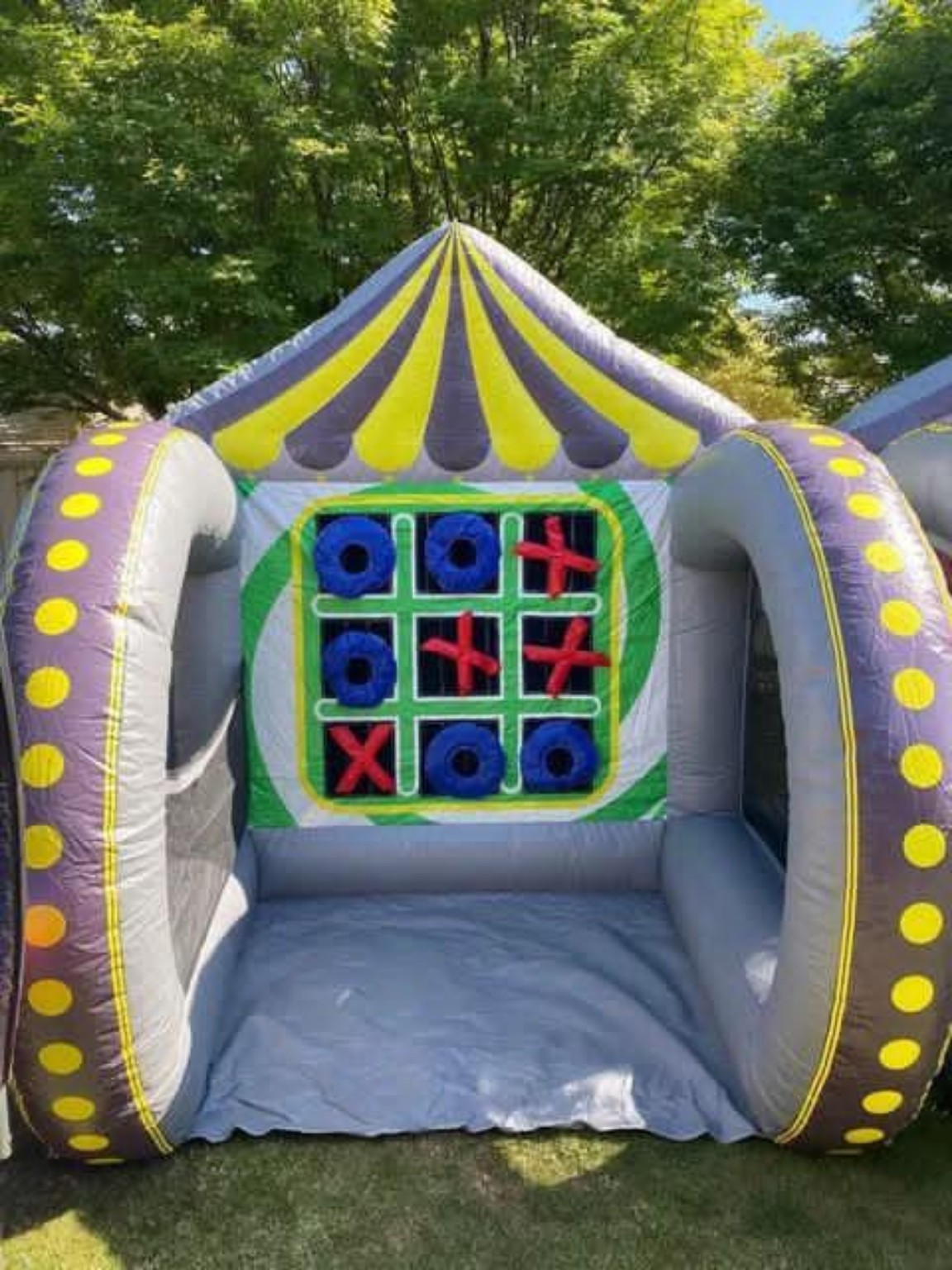 Giant inflatable tic tac toe game in the sunshine